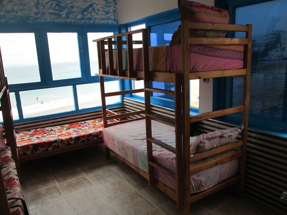 Кровать в общем номере Tazerzit Hostel-Restau