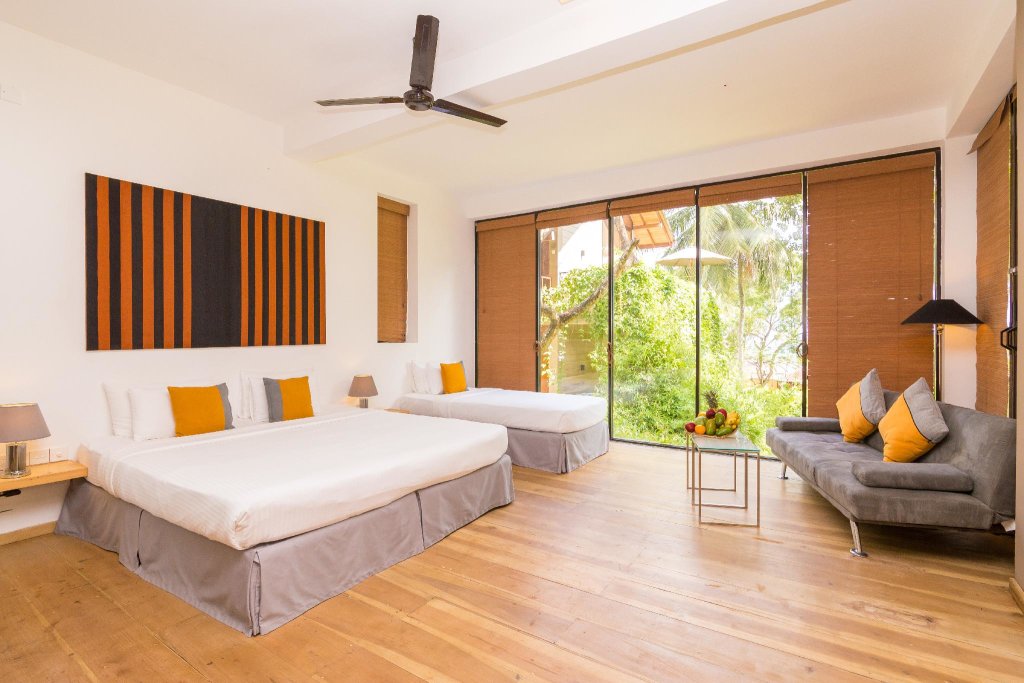 Habitación triple De lujo Palm Paradise Cabanas & Villas Beach Resort