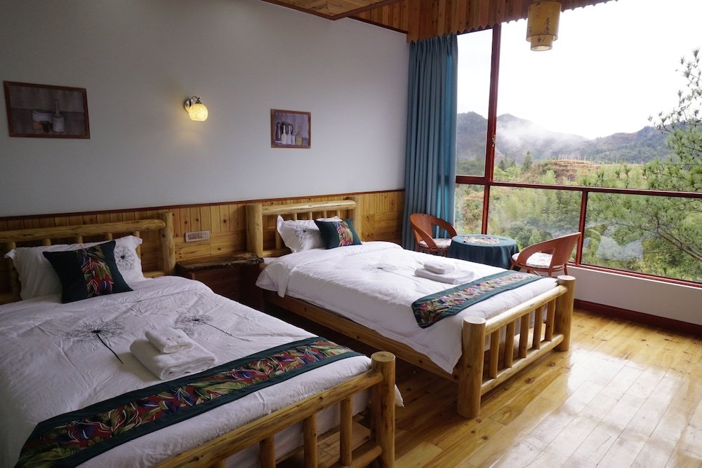 Habitación doble Estándar con balcón y con vista a la montaña Longji Rice Terraces Hostel