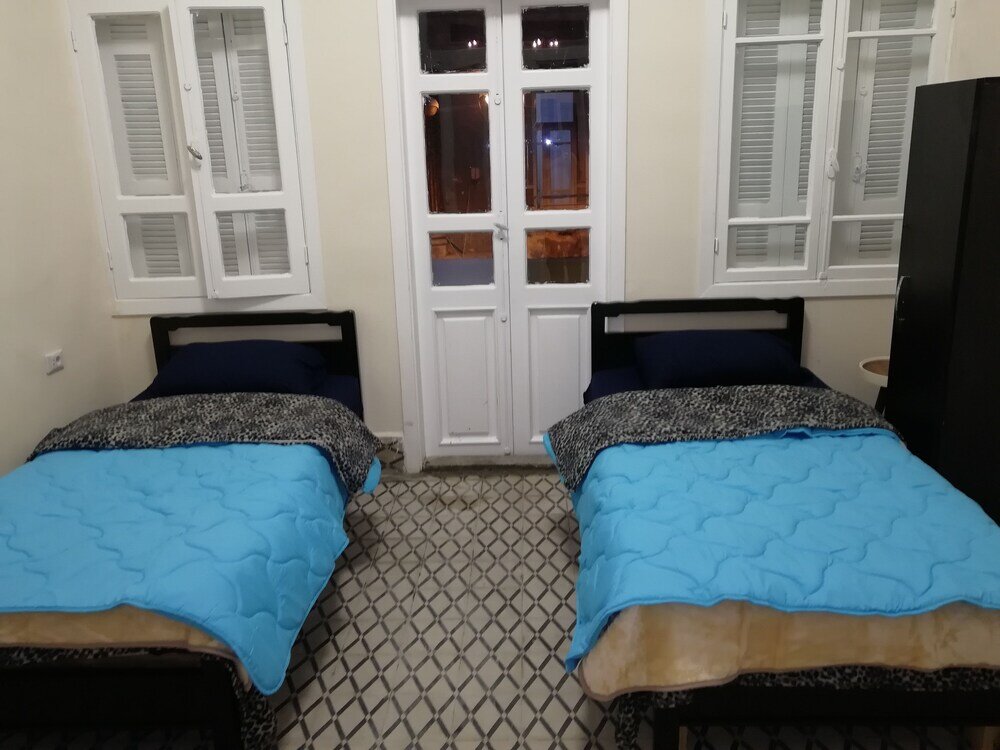 Кровать в общем номере SEED Guest House