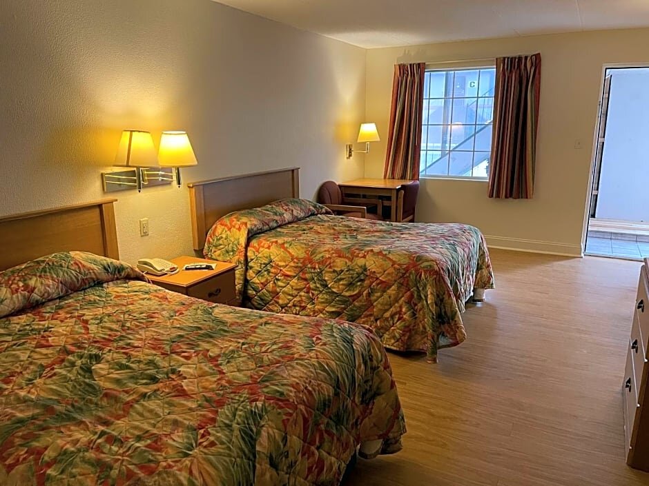 Standard quadruple chambre Wildwood Inn Tropical Dome & Theme Suites