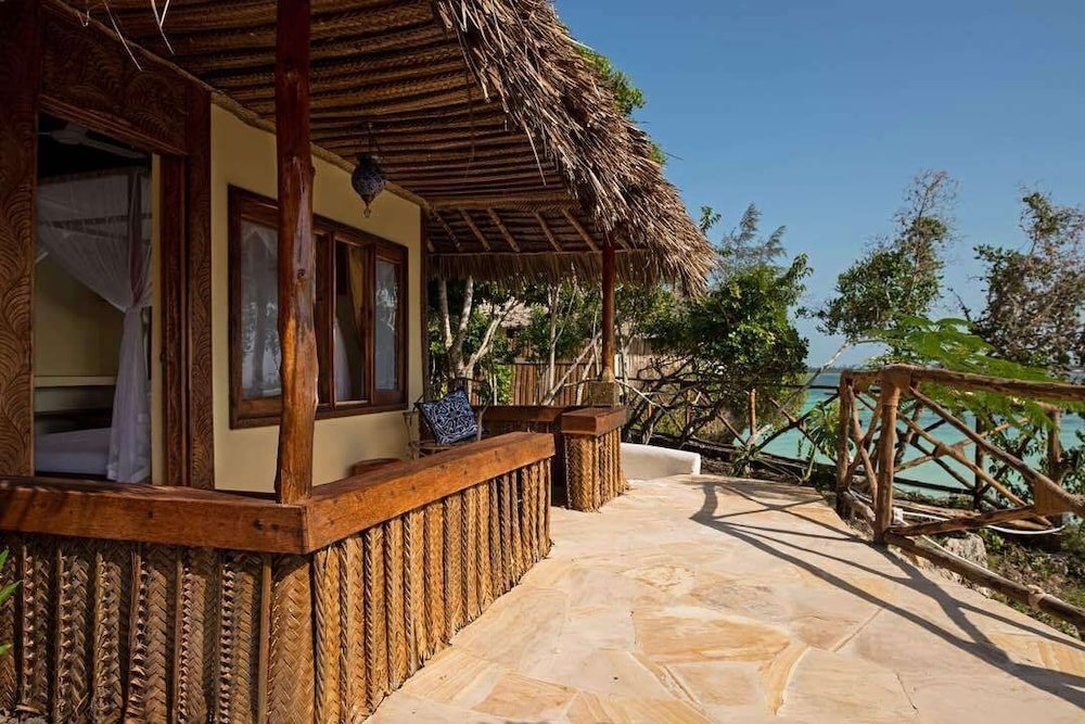 Standard Doppel Zimmer mit Balkon und mit Blick auf die Bucht The Island - Pongwe Lodge