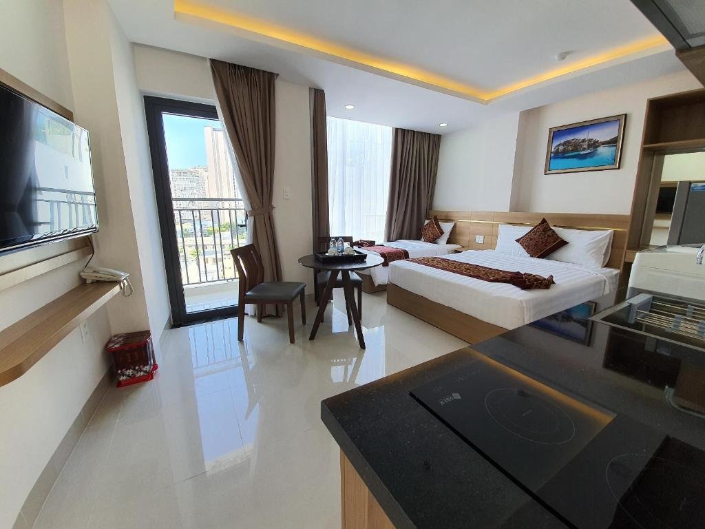 Standard triple chambre avec balcon XO Hotel & Apartments