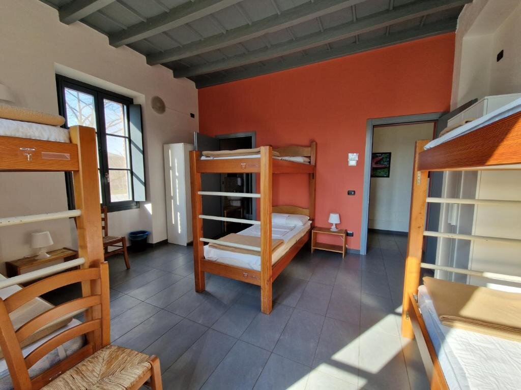 Кровать в общем номере Ostello Costa Alta