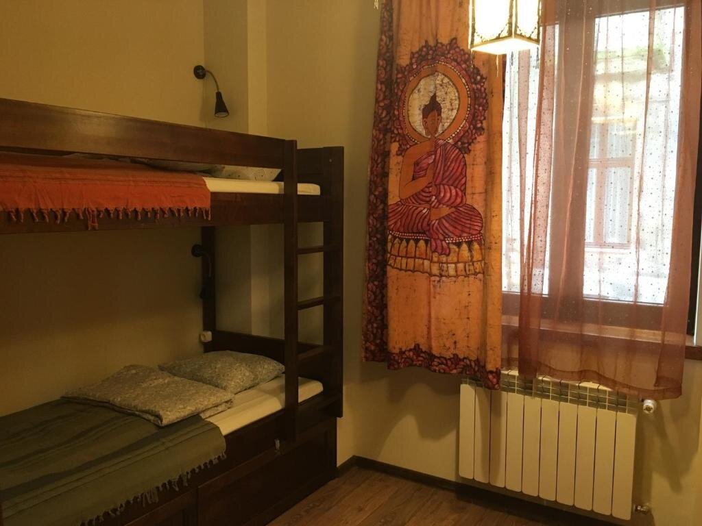 Кровать в общем номере Mundo Hostel