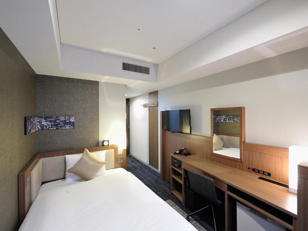 Cama en dormitorio compartido (dormitorio compartido femenino) HOTEL UNIZO Yokohamaeki-West