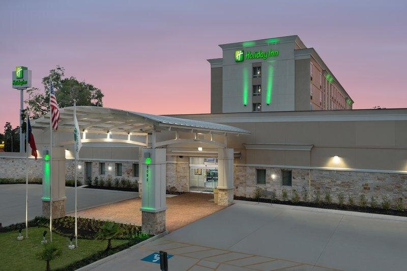 Кровать в общем номере Holiday Inn - Beaumont East-Medical Ctr Area, an IHG Hotel