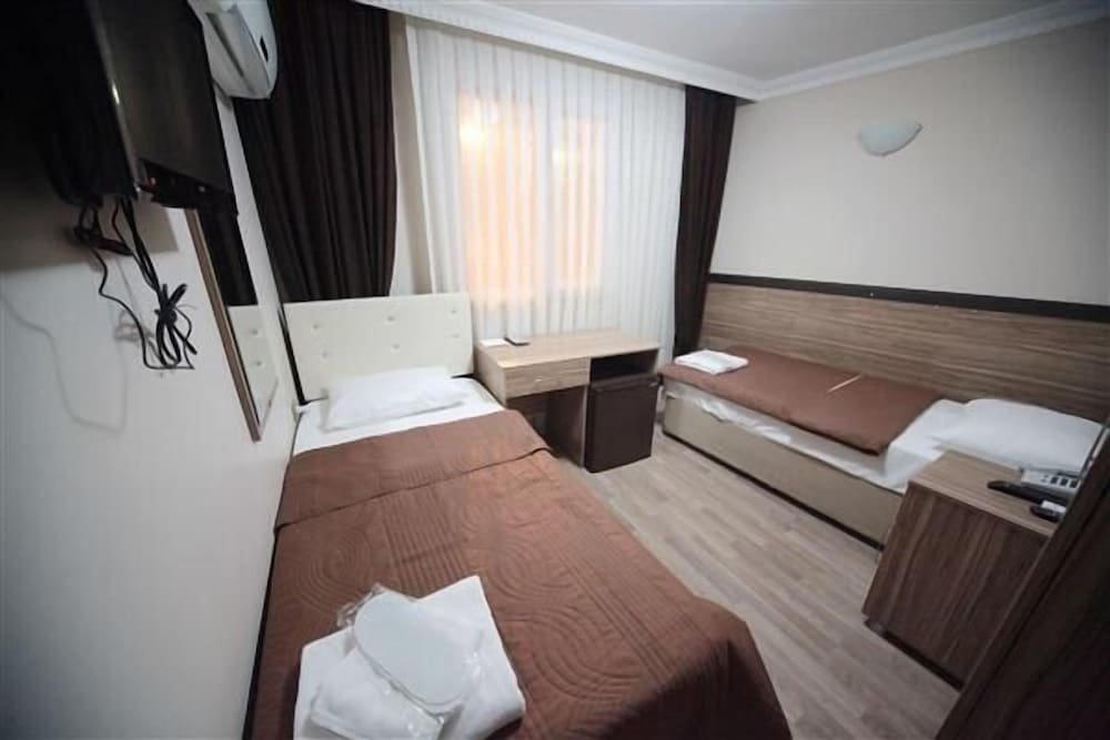 Standard Quadruple room Hotel Simper