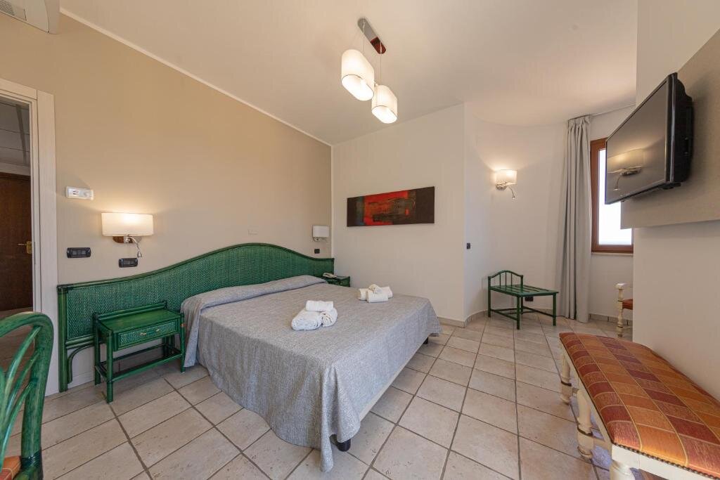 Standard triple chambre Hotel Baia Del Capitano