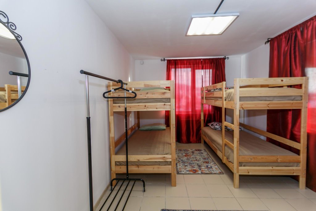 Кровать в общем номере Мини-Отель Палитра