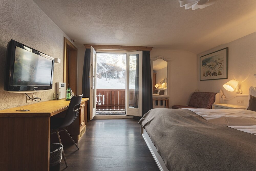 Семейный номер Standard с 2 комнатами с балконом и с видом на горы Hotel THE LARIX ski-in ski-out