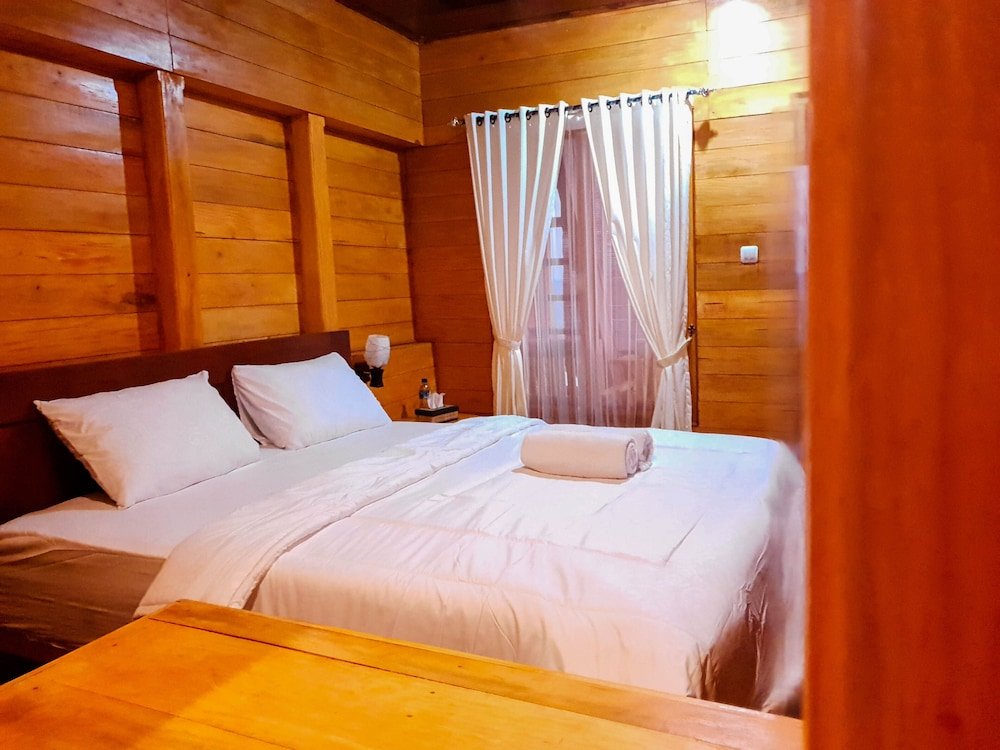 Семейное бунгало с 2 комнатами с видом на море Malibu Huts