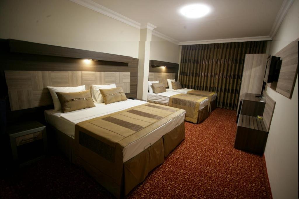 Standard quadruple chambre Hotel Guven
