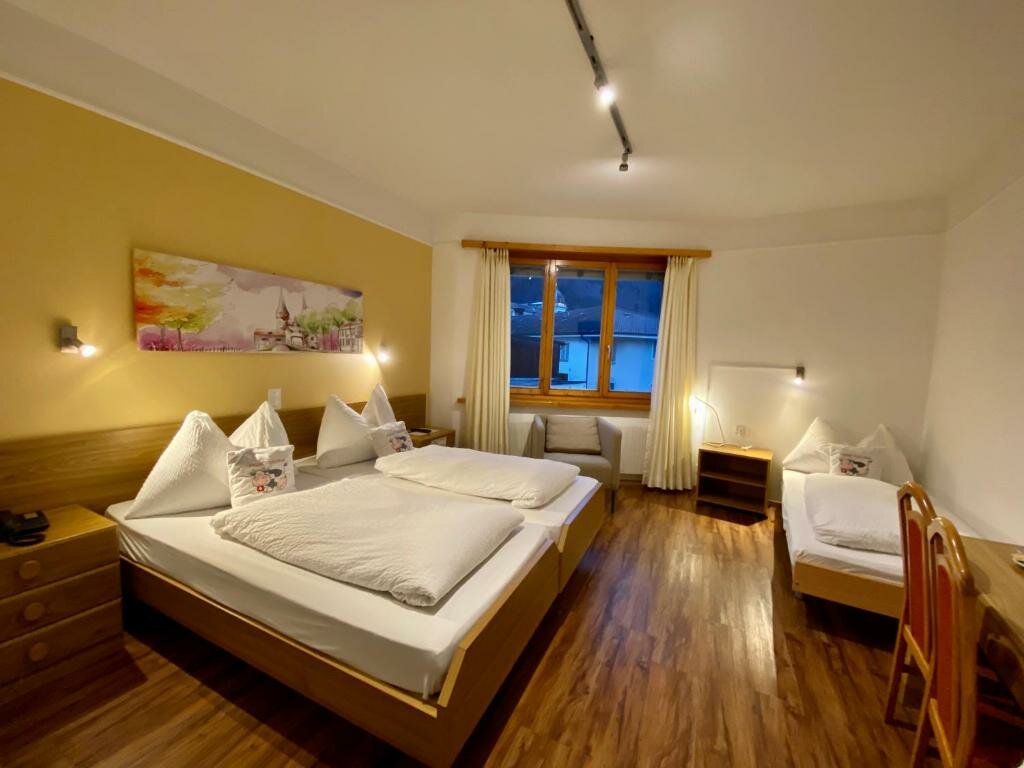 Standard Quadruple room Hotel Toscana