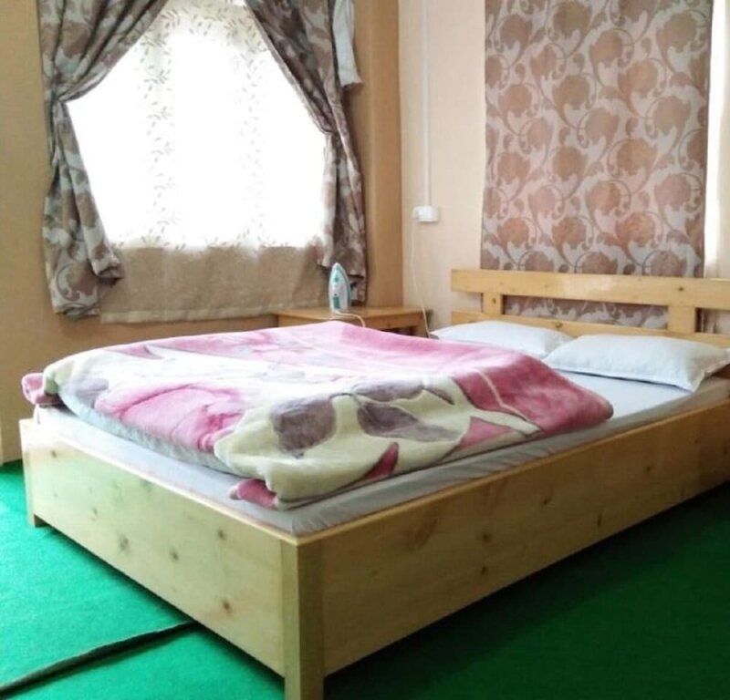 Номер Deluxe OurGuest Bichu Homestay