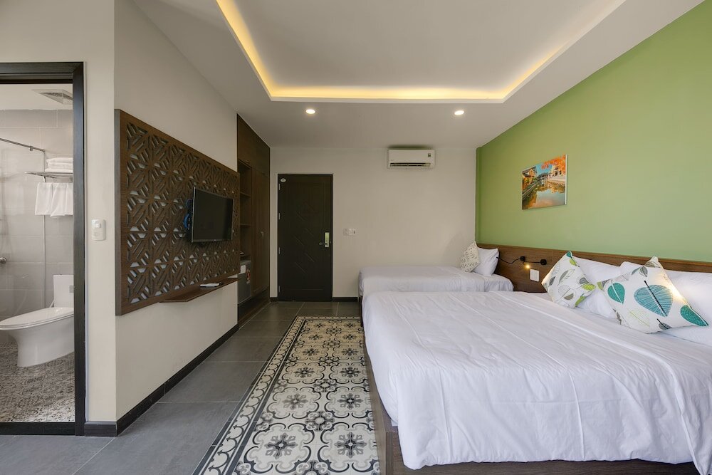 Standard triple chambre avec balcon Lami Villa Hoian 1
