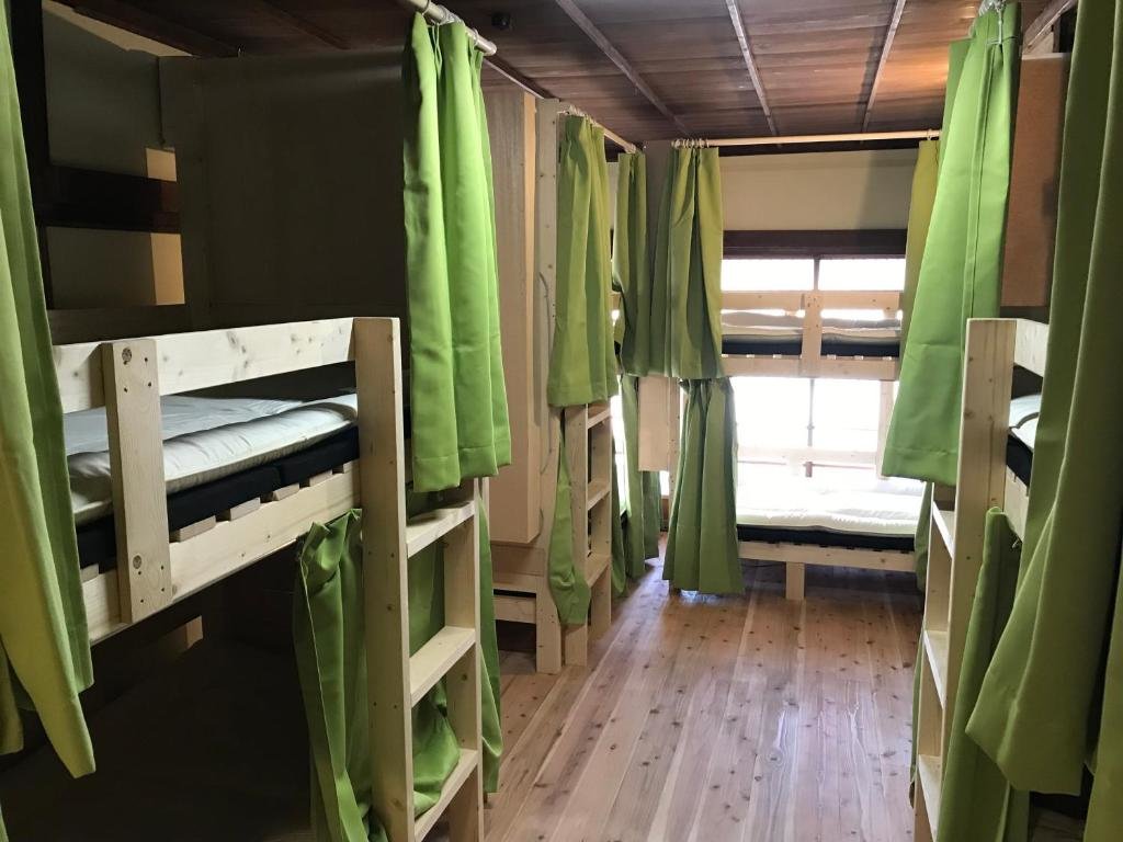 Cama en dormitorio compartido Guesthouse Matsushiro Walkers