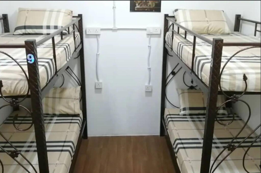 Cama en dormitorio compartido Daud Safar Rest House