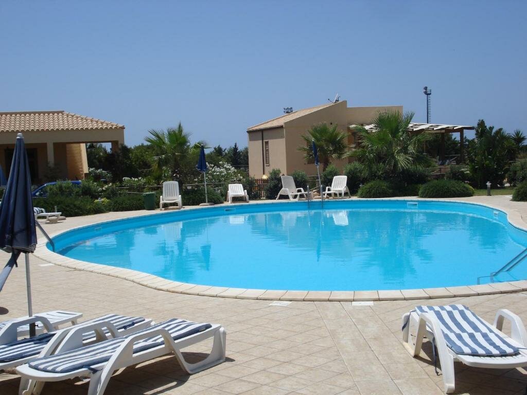 Standard room Casa Vacanze Libeccio - Villetta con giardino e piscina condominiale