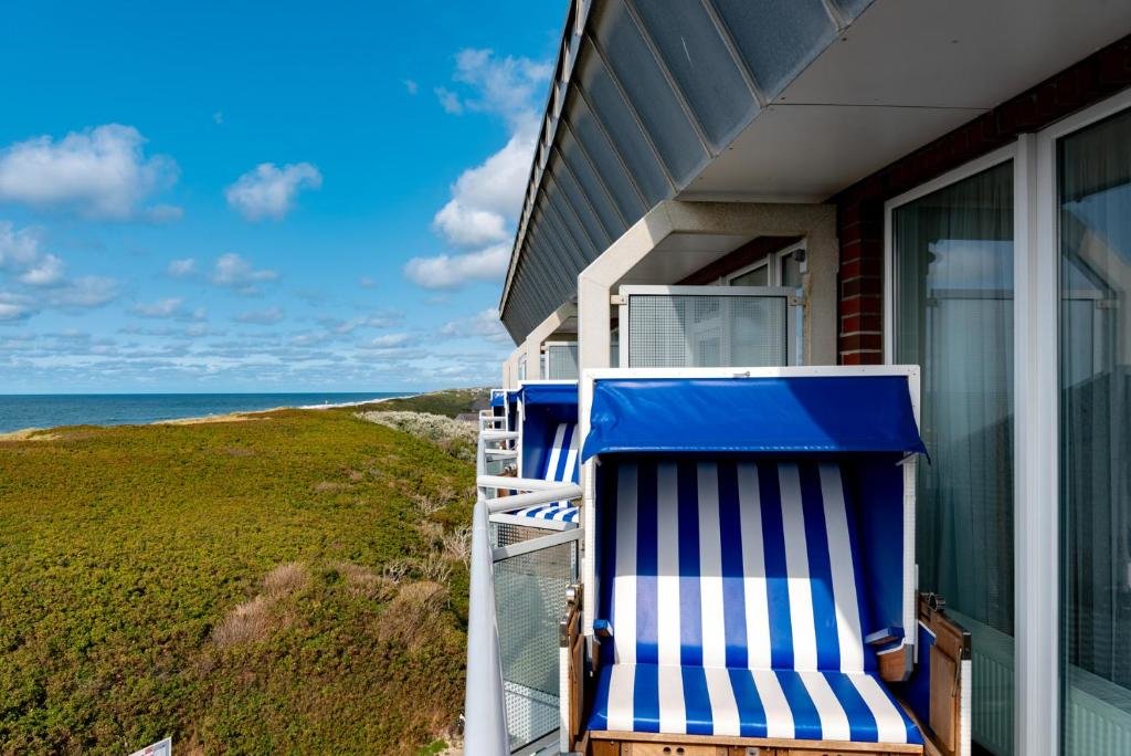 Habitación doble De lujo con balcón y con vista al mar Wyn. Strandhotel Sylt