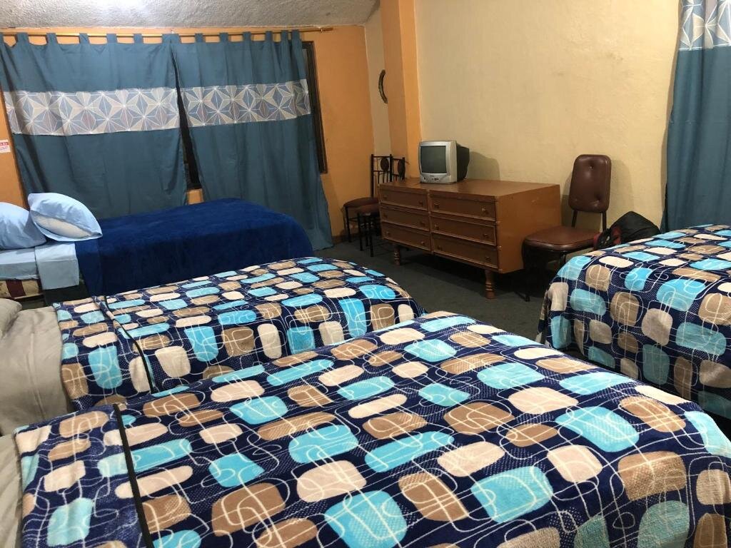 Cama en dormitorio compartido Hostal Pachamama