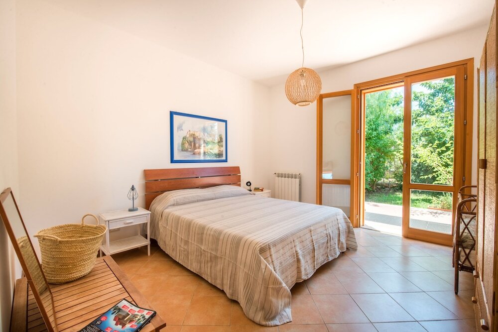 Apartment 2 Schlafzimmer mit Gartenblick Calarossa Seaview by Wonderful Italy