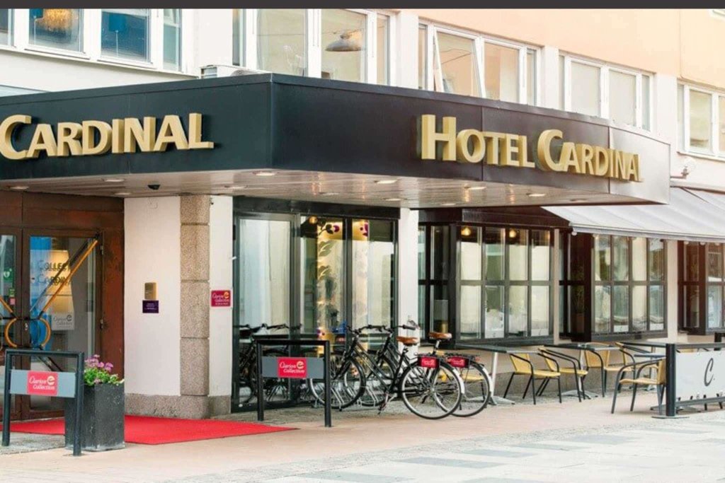 Кровать в общем номере Clarion Collection Hotel Cardinal