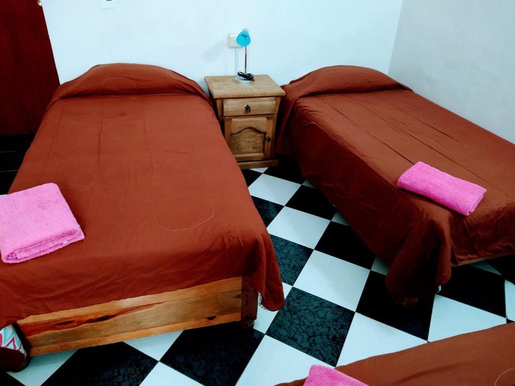 Кровать в общем номере Casa Lupita Hostel