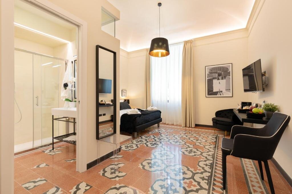 Camera Deluxe Foresteria Di Piazza Cavour - Luxury Suites And Guest House