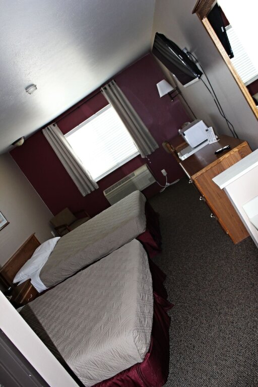 Standard Quadruple room Capri Inn & Suites - Beatrice