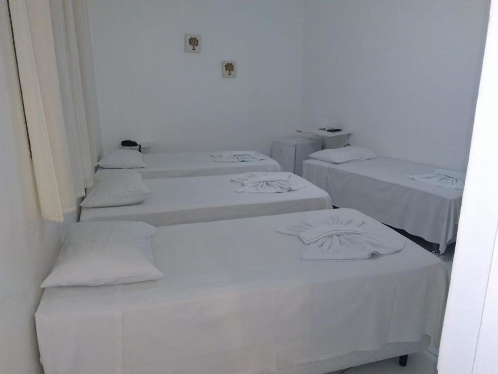 Кровать в общем номере Planalto Hotel Arujá