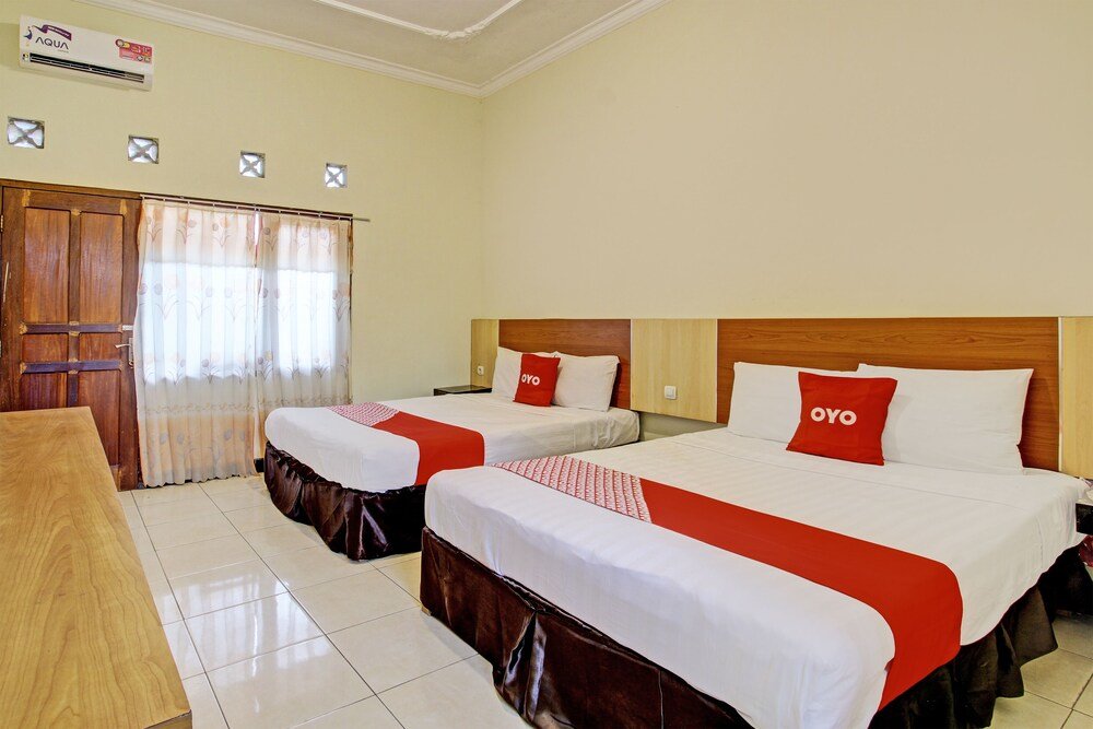 Suite OYO 93660 New Family Hotel