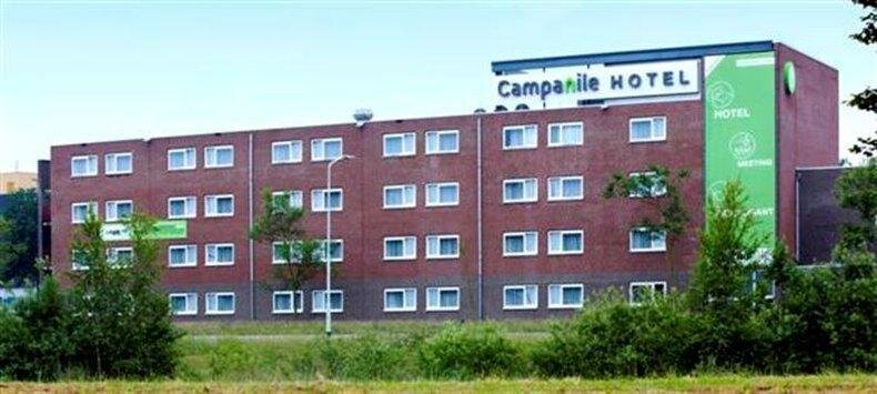 Кровать в общем номере Campanile Hotel & Restaurant Breda