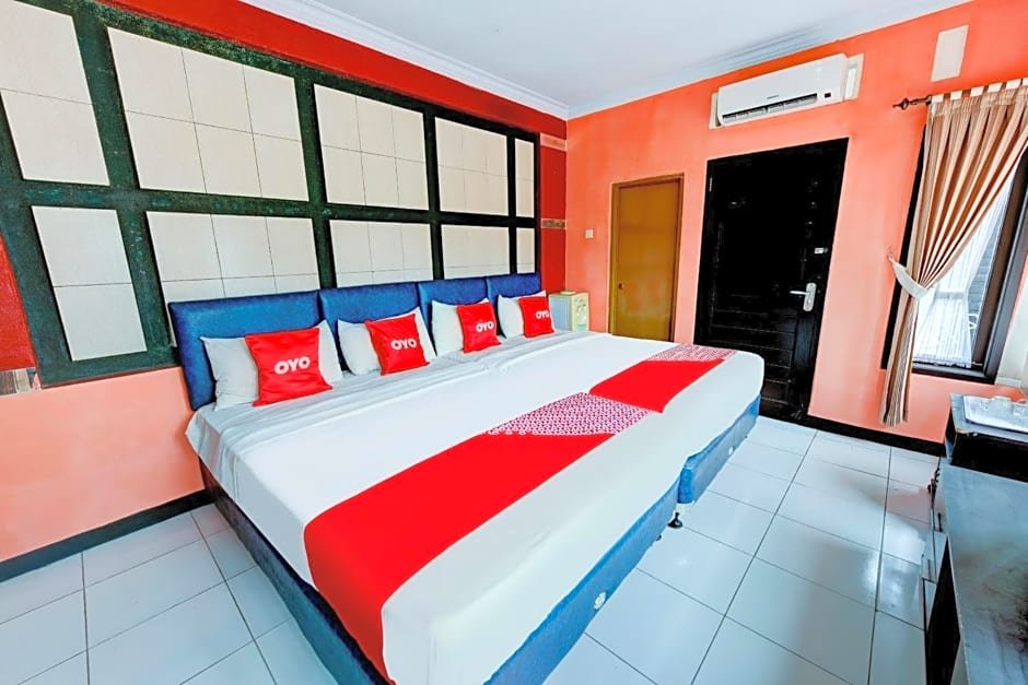 Deluxe Family room Indah Savana Hotel Mitra RedDoorz