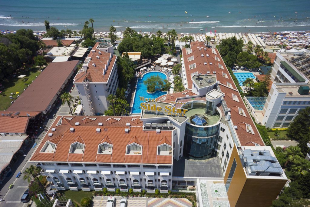 Кровать в общем номере с видом на море Отель Side Star Beach