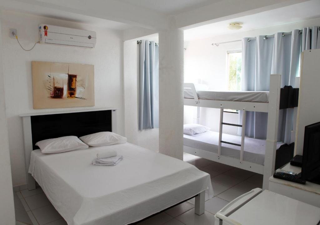 Standard Quadruple room with sea view Hotel Pousada Oasis
