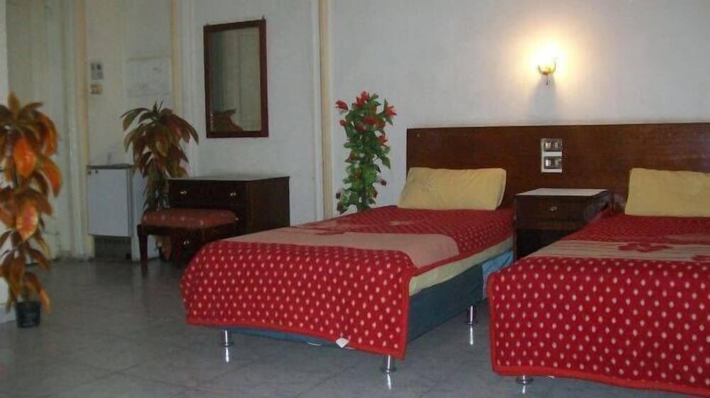 Standard Dreier Zimmer mit Balkon Regent House - Hostel
