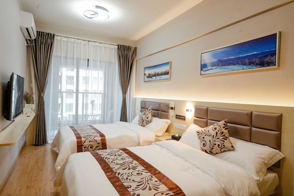 Deluxe double chambre avec balcon Yue Tu Apartment Hotel