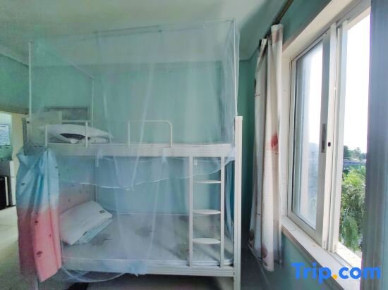Кровать в общем номере Meng Tian Ya Hostel
