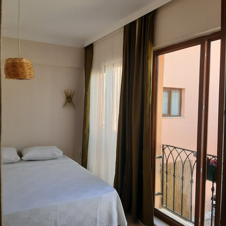 Camera quadrupla familiare Standard 1 camera da letto con vista sulla città CasaLyma Hotel Ayvalık
