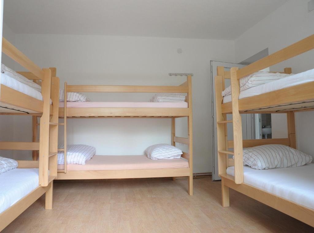Кровать в общем номере Hostel Omega
