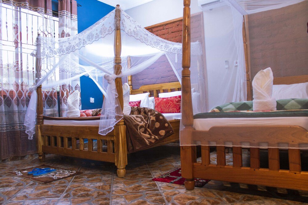 Standard triple famille chambre avec balcon Mantis Lodge & Camping Site