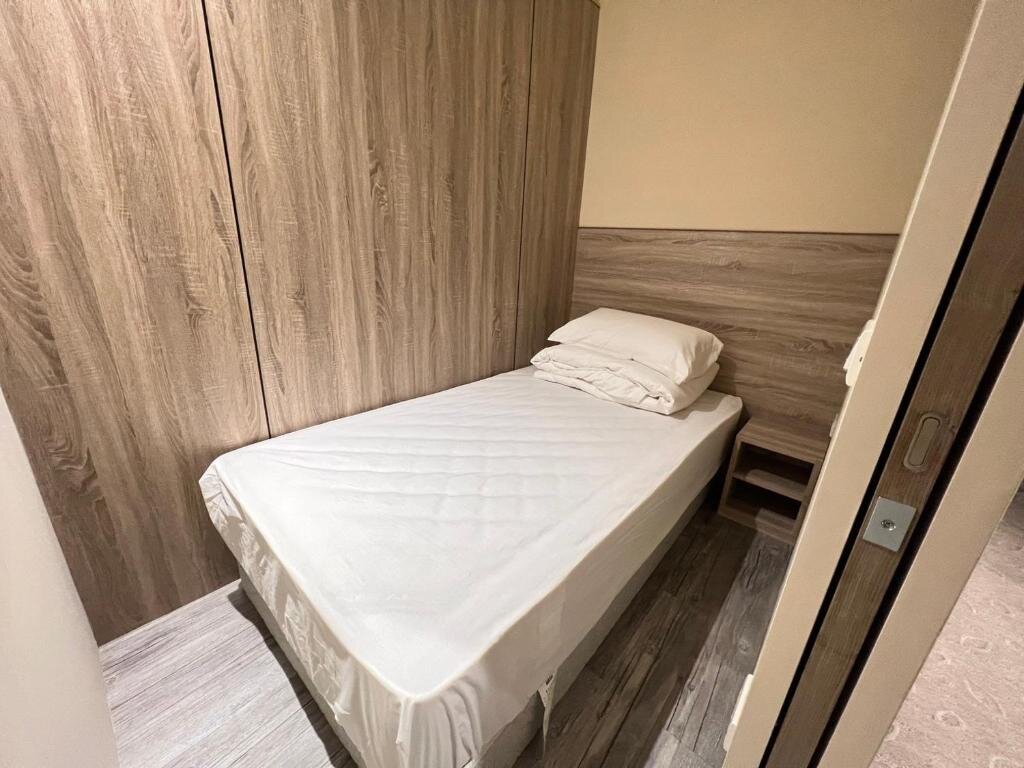 Кровать в общем номере (мужской номер) Grace Hotel Dunbei