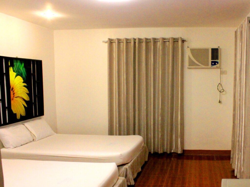 Четырёхместный номер Standard Bakasyunan Resort and Conference Center - Tanay