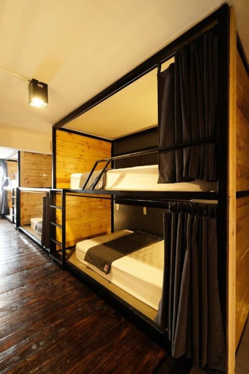 Кровать в общем номере Bandai Hostel
