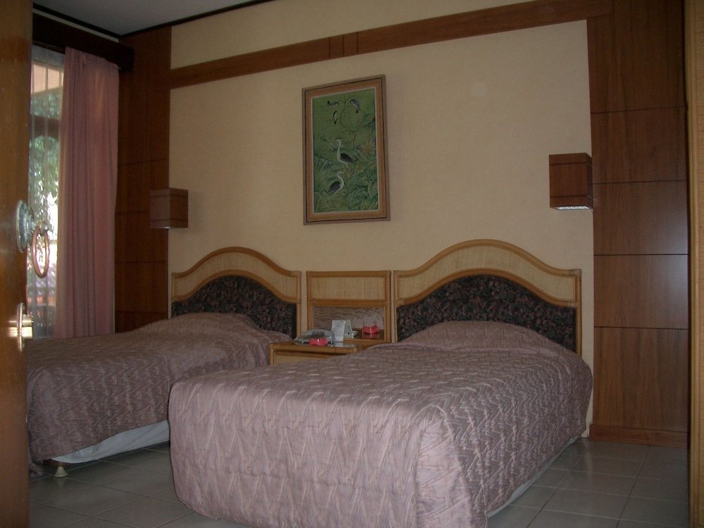2 Bedrooms Standard Family room with balcony Puri Naga Beachfront Cottages
