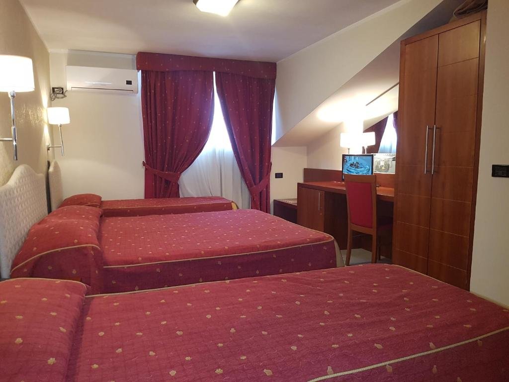Superior Quadruple room Pisani Hotel