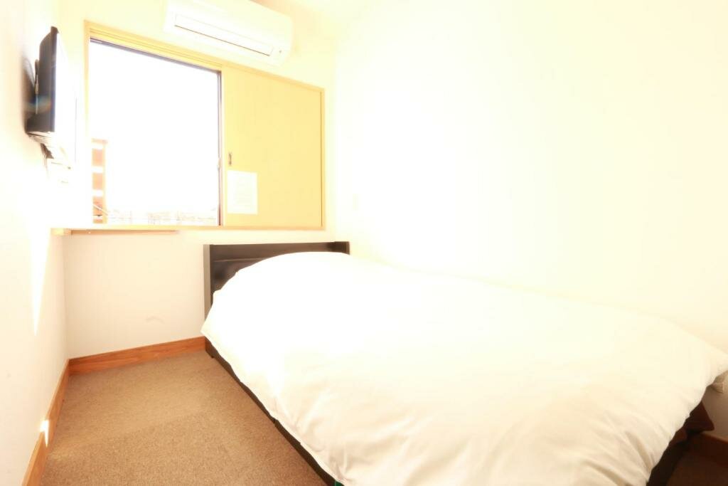 Cama en dormitorio compartido (dormitorio compartido masculino) Simple Sleep 個室カプセル