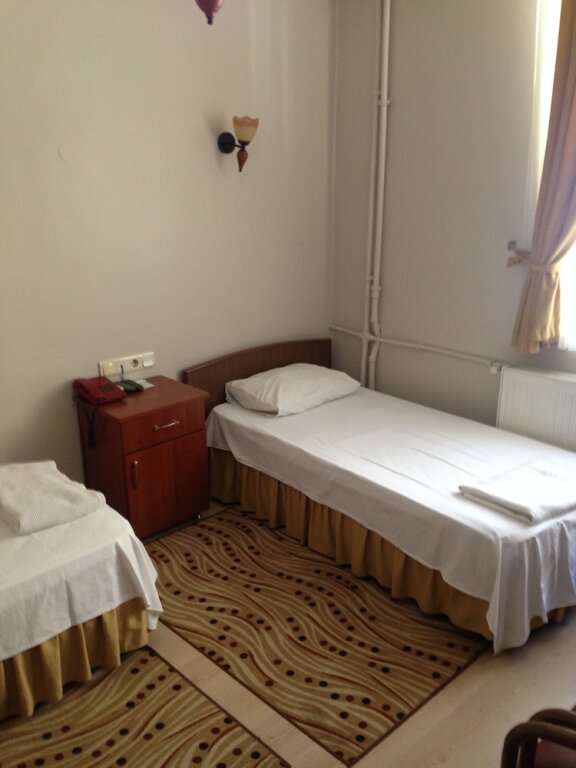 Standard quadruple chambre Hotel Atasayan