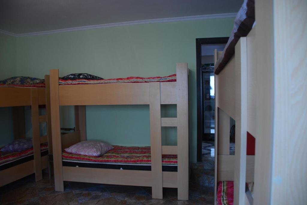 Cama en dormitorio compartido House in Mestia